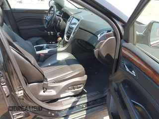 2015 Cadillac SRX Premium Collection with VIN 3GYFNDE38FS569129, listed as a IAAI auction lot 42485655 with 96,717 mi miles and . Bid and sale history available at DreamBid. Image 5.