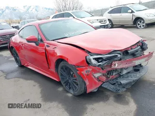 2015 Scion FR-S with VIN JF1ZNAA11F9712128, listed as a IAAI auction lot 41467323 with 106,826 mi miles. Bid and sale history available at carsss.com. Image 1.