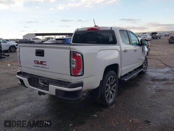 2021 GMC Canyon 4WD Denali with VIN 1GTG6EEN6M1240894, listed as a IAAI auction lot 41387786 with 73,323 mi miles. Bid and sale history available at carsss.com. Image 4.