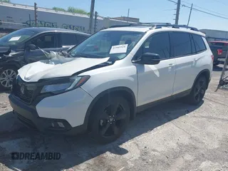 2019 Honda Passport Elite z VIN 5FNYF8H09KB015198, wystawiony jako IAAI lot #41989518 z przebiegiem 80 919 mil mil oraz . Historia ofert i sprzedaży dostępna na DreamBid. Obrazek 2.