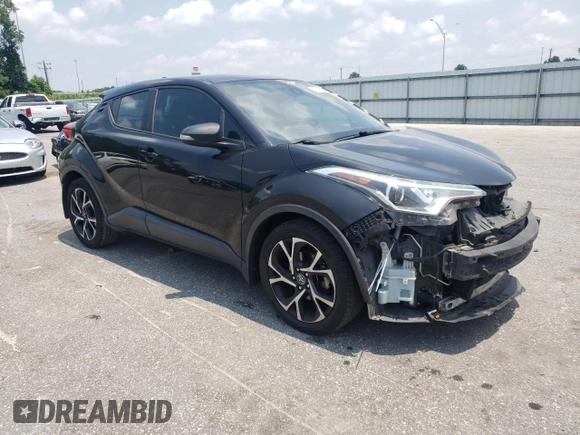 2018 Toyota C-HR XLE with VIN NMTKHMBX1JR015638, listed as a Copart auction lot 63514335 with 445,884 mi miles and Salvage title. Bid and sale history available at DreamBid. Image 4.