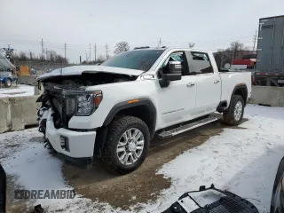 2020 GMC Sierra 3500HD Denali z VIN 1GT49WEY7LF133168, wystawiony jako Copart lot #44457115 z przebiegiem Nie podano mil oraz Szkody całkowita. Historia ofert i sprzedaży dostępna na DreamBid. Obrazek 1.