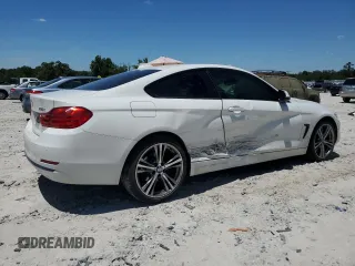 2017 BMW 4 Series 430i xDrive with VIN WBA4R9C3XHK878808, listed as a Copart auction lot 58300774 with 145,067 mi miles and Salvage Title. Bid and sale history available at DreamBid. Image 3.