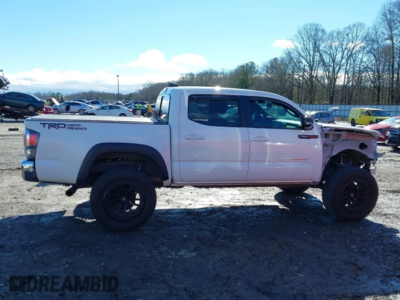 2020 Toyota Tacoma SR5 with VIN 3TMAZ5CN4LM132002, listed as a IAAI auction lot 41224844 with 55,000 mi miles and . Bid and sale history available at DreamBid. Image 14.