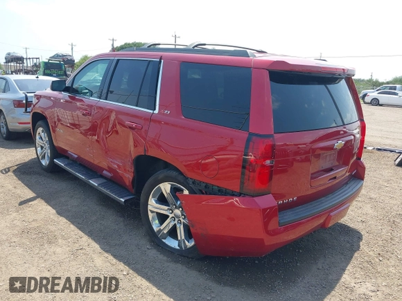 2015 Chevrolet Tahoe LT with VIN 1GNSKBKC6FR628355, listed as a IAAI auction lot 42159743 with 95,730 mi miles and . Bid and sale history available at DreamBid. Image 6.