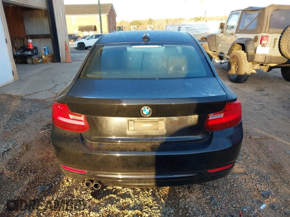 2015 BMW 2 Series 228i with VIN WBA1F5C55FV256604, listed as a IAAI auction lot 41841754 with 118,354 mi miles. Bid and sale history available at carsss.com. Image 16.