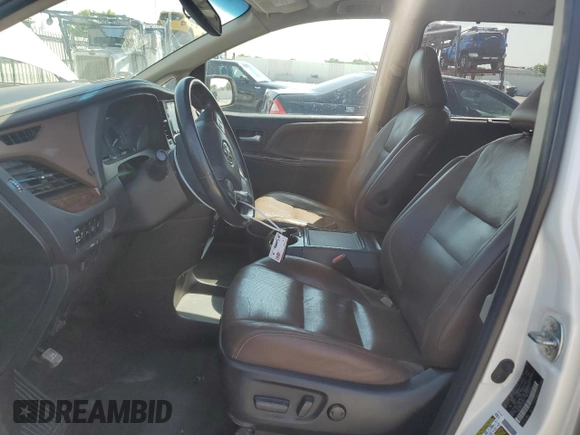 2015 Toyota Sienna Limited with VIN 5TDDK3DC5FS104572, listed as a Copart auction lot 62145625 with 156,740 mi miles and Salvage title. Bid and sale history available at DreamBid. Image 7.