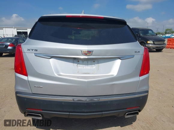 2017 Cadillac XT5 Premium Luxury AWD z VIN 1GYKNERS6HZ112170, wystawiony jako IAAI lot #42262116 z przebiegiem 140 982 mil mil oraz . Historia ofert i sprzedaży dostępna na DreamBid. Obrazek 16.