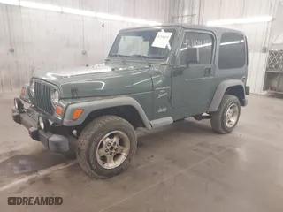 1999 Jeep Wrangler Sport with VIN 1J4FY19S0XP496555, listed as a IAAI auction lot 42110414 with 125,500 mi miles. Bid and sale history available at carsss.com. Image 2.