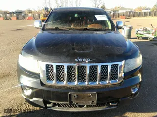 2012 Jeep Grand Cherokee Overland with VIN 1C4RJFCT8CC268410, listed as a IAAI auction lot 41823909 with 205,940 mi miles. Bid and sale history available at carsss.com. Image 12.