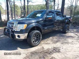 2011 Ford F-150 XLT with VIN 1FTFW1ET8BFA70797, listed as a IAAI auction lot 41909232 with 118,843 mi miles. Bid and sale history available at carsss.com. Image 2.