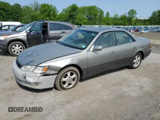 1997 Lexus ES 300 z VIN JT8BF22G4V0056137, wystawiony jako Copart lot #59353285 z przebiegiem 150 348 mil mil oraz Szkoda całkowita • Salvage title. Historia ofert i sprzedaży dostępna na DreamBid. Obrazek 1.