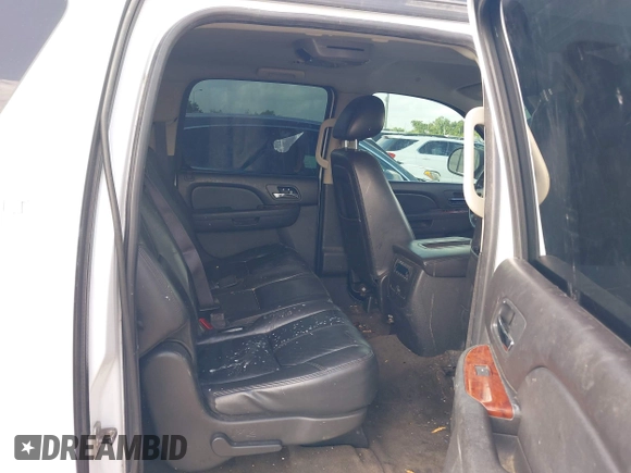2011 Chevrolet Suburban LT with VIN 1GNSCJE09BR150452, listed as a IAAI auction lot 42655961 with 208,311 mi miles and . Bid and sale history available at DreamBid. Image 8.