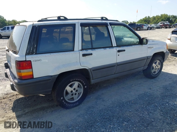 1994 Jeep Grand Cherokee Laredo with VIN 1J4GZ58S6RC295621, listed as a IAAI auction lot 42751869 with 370,230 mi miles and . Bid and sale history available at DreamBid. Image 4.