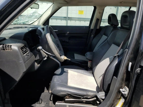 2008 Jeep Patriot Sport with VIN 1J8FT28WX8D574026, listed as a Copart auction lot 50238525 with 166,024 mi miles and Salvage Title. Bid and sale history available at carsss.com. Image 7.