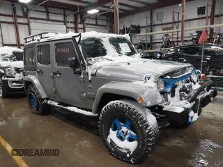 2013 Jeep Wrangler Unlimited Sport z VIN 1C4BJWDG3DL628784, wystawiony jako IAAI lot #41311183 z przebiegiem 125 118 mil mil oraz . Historia ofert i sprzedaży dostępna na DreamBid. Obrazek 1.