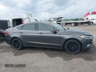 2018 Ford Fusion Titanium z VIN 3FA6P0K9XJR160993, wystawiony jako IAAI lot #41938148 z przebiegiem 137 410 mil mil oraz . Historia ofert i sprzedaży dostępna na DreamBid. Obrazek 13.