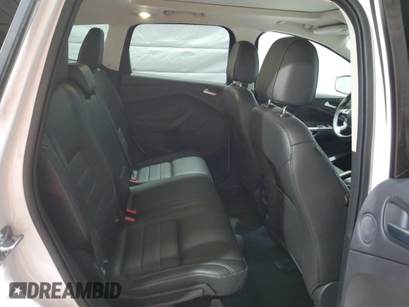 2016 Ford Escape Titanium with VIN 1FMCU9J93GUB78230, listed as a Copart auction lot 51661025 with 98,515 mi miles and Salvage Title. Bid and sale history available at DreamBid. Image 11.