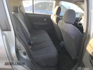 2009 Nissan Versa 1.8 S with VIN 3N1BC13E49L362266, listed as a Copart auction lot 52370025 with 101,184 mi miles and Salvage Title. Bid and sale history available at carsss.com. Image 10.