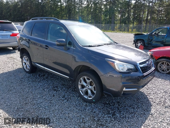 2018 Subaru Forester Touring with VIN JF2SJAWC6JH608722, listed as a IAAI auction lot 42309259 with 93,426 mi miles and . Bid and sale history available at DreamBid. Image 1.