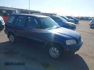 1999 Honda CR-V LX with VIN JHLRD1846XC028583, listed as a IAAI auction lot 42154092 with 200,228 mi miles. Bid and sale history available at carsss.com. Image 1.