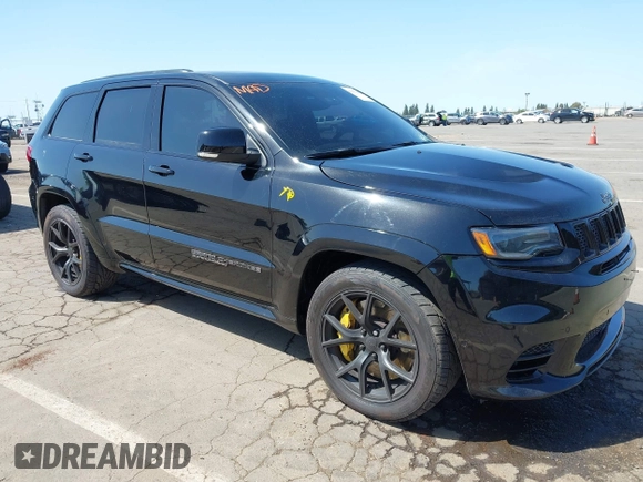 2020 Jeep Grand Cherokee Trackhawk with VIN 1C4RJFN96LC336561, listed as a IAAI auction lot 41991800 with 58,781 mi miles and . Bid and sale history available at DreamBid. Image 1.