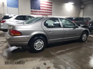 1999 Dodge Stratus z VIN 1B3EJ46X0XN690121, wystawiony jako Copart lot #83056374 z przebiegiem Nie podano mil oraz Szkoda całkowita • Salvage title. Historia ofert i sprzedaży dostępna na DreamBid. Obrazek 3.