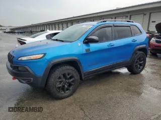 2017 Jeep Cherokee Trailhawk z VIN 1C4PJMBS1HW648716, wystawiony jako Copart lot #57490635 z przebiegiem 94 983 mil mil oraz Szkoda całkowita • Salvage title. Historia ofert i sprzedaży dostępna na DreamBid. Obrazek 1.