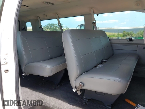 2003 Ford Econoline Passenger XL with VIN 1FBSS31L93HB99802, listed as a IAAI auction lot 42137197 with 56,656 mi miles. Bid and sale history available at carsss.com. Image 8.