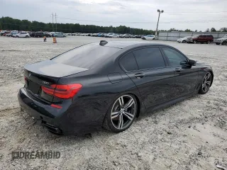 2019 BMW 7 Series 750i with VIN WBA7F0C57KGM25906, listed as a Copart auction lot 62728443 with 61,561 mi miles. Bid and sale history available at carsss.com. Image 3.