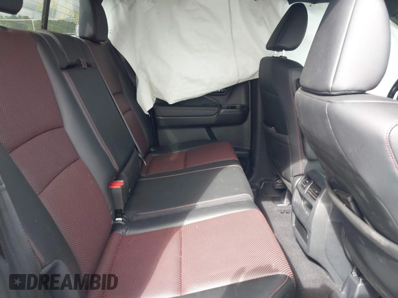 2023 Honda Ridgeline Black Edition with VIN 5FPYK3F88PB018969, listed as a IAAI auction lot 42264424 with 19,193 mi miles and . Bid and sale history available at DreamBid. Image 8.