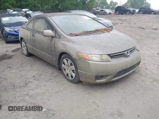 2008 Honda Civic Cpe LX with VIN 2HGFG11638H524802, listed as a IAAI auction lot 42117211 with 145,778 mi miles. Bid and sale history available at carsss.com. Image 1.