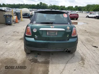 2007 MINI Hardtop with VIN WMWMF33537TL77985, listed as a Copart auction lot 61908635 with 180,470 mi miles and Salvage title. Bid and sale history available at DreamBid. Image 6.