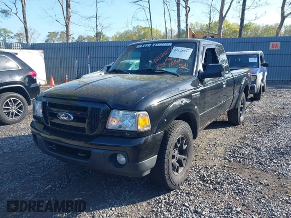 2011 Ford Ranger XLT with VIN 1FTLR4FE9BPB07796, listed as a IAAI auction lot 42128597 with 235,512 mi miles. Bid and sale history available at carsss.com. Image 18.