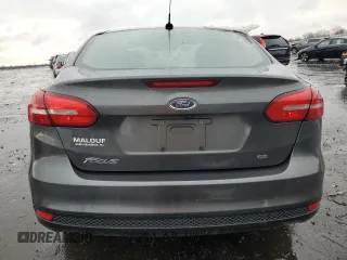 2016 Ford Focus SE with VIN 1FADP3F26GL354210, listed as a Copart auction lot 50378885 with 9,617 mi miles and Salvage Title. Bid and sale history available at DreamBid. Image 6.