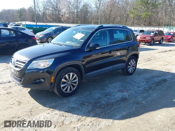 2011 Volkswagen Tiguan SE with VIN WVGBV7AX1BW502770, listed as a IAAI auction lot 41739698 with 160,556 mi miles and . Bid and sale history available at DreamBid. Image 2.