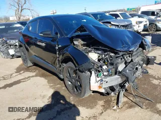 2021 Toyota C-HR LE with VIN JTNKHMBX2M1098138, listed as a IAAI auction lot 41679903 with 49,390 mi miles. Bid and sale history available at carsss.com. Image 1.