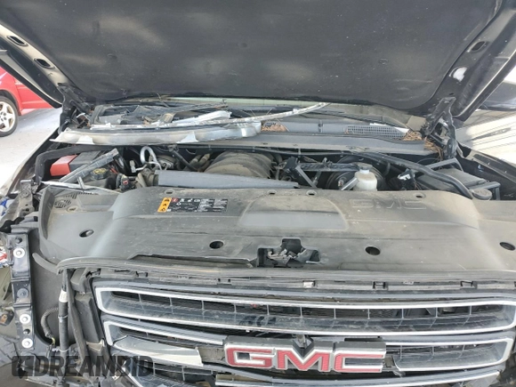 2019 GMC Yukon SLT with VIN 1GKS2BKCXKR108358, listed as a Copart auction lot 83765624 with 127,724 mi miles and Salvage Title. Bid and sale history available at carsss.com. Image 12.