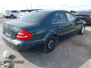 2003 Mercedes-Benz E-Class 3.2L with VIN WDBUF65J23X111728, listed as a IAAI auction lot 41965931 with 85,524 mi miles. Bid and sale history available at carsss.com. Image 4.
