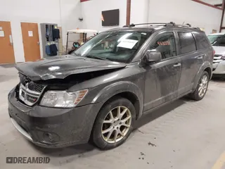 2014 Dodge Journey Limited with VIN 3C4PDDDG9ET204338, listed as a IAAI auction lot 41676032 with 223,129 mi miles. Bid and sale history available at carsss.com. Image 17.