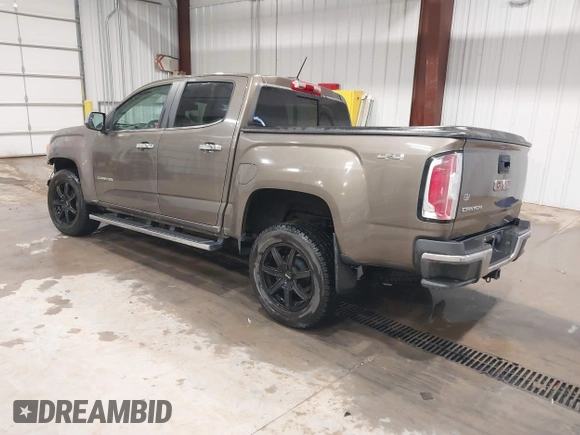 2016 GMC Canyon 4WD SLT z VIN 1GTP6DE13G1229783, wystawiony jako IAAI lot #41583360 z przebiegiem 80 149 mil mil oraz . Historia ofert i sprzedaży dostępna na DreamBid. Obrazek 3.