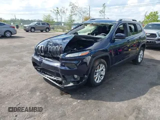 2015 Jeep Cherokee Latitude with VIN 1C4PJLCB5FW694359, listed as a IAAI auction lot 41934213 with 117,723 mi miles and . Bid and sale history available at DreamBid. Image 17.