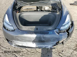2021 Tesla Model Y Standard Range with VIN 5YJYGDED7MF109418, listed as a Copart auction lot 51590135 with 86,668 mi miles and Salvage Title. Bid and sale history available at DreamBid. Image 13.