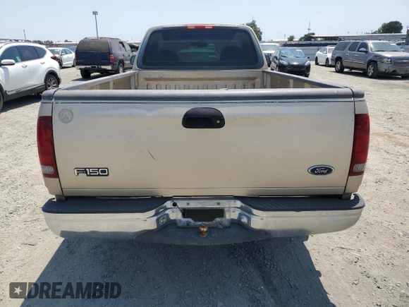 2000 Ford F-150 XL with VIN 1FTZF172XYNB65958, listed as a Copart auction lot 59946145 with 208,988 mi miles and Salvage title. Bid and sale history available at DreamBid. Image 6.
