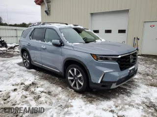 2023 Honda Pilot Elite with VIN 5FNYG1H83PB041216, listed as a Copart auction lot 84077974 with 21,257 mi miles and Salvage Title. Bid and sale history available at carsss.com. Image 4.