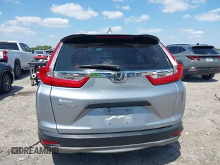2019 Honda CR-V LX with VIN 2HKRW5H31KH411771, listed as a IAAI auction lot 42060193 with 175,036 mi miles and . Bid and sale history available at DreamBid. Image 16.