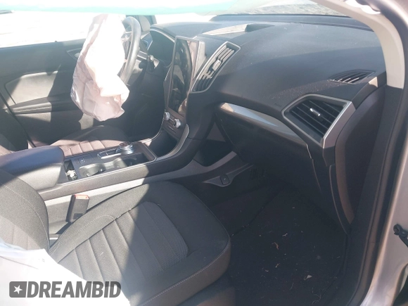 2021 Ford Edge SE z VIN 2FMPK3G92MBA23309, wystawiony jako IAAI lot #41586140 z przebiegiem 23 593 mil mil oraz . Historia ofert i sprzedaży dostępna na DreamBid. Obrazek 5.