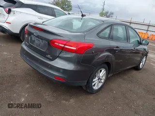 2016 Ford Focus SE with VIN 1FADP3F21GL324547, listed as a IAAI auction lot 41860377 with 39,410 mi miles. Bid and sale history available at carsss.com. Image 4.