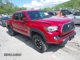 2019 Toyota Tacoma SR z VIN 5TFCZ5ANXKX190152, wystawiony jako IAAI lot #42210978 z przebiegiem 139 314 mil mil oraz . Historia ofert i sprzedaży dostępna na DreamBid. Obrazek 1.