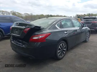 2018 Nissan Altima S with VIN 1N4AL3AP3JC195154, listed as a IAAI auction lot 41879582 with 160,162 mi miles and . Bid and sale history available at DreamBid. Image 4.